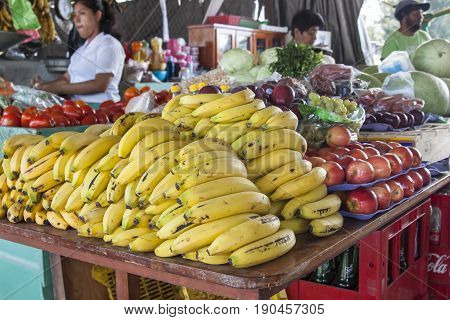 San Ignacio Belize - March 1 2017: market in San Ignacio Belize selling vegetables and fruit like bananas apples and tomatoes
