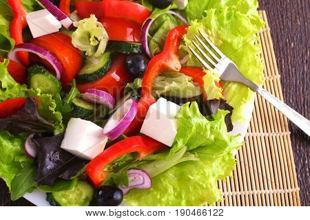 Fresh vegetables on wooden and blur background.