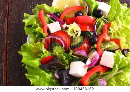 Fresh vegetables on wooden and blur background.