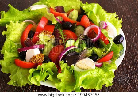 Fresh vegetables on wooden and blur background.