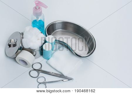 First aid kit for bandaging isolated on white
