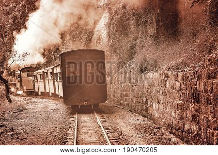 Steam narrow-gauge train moves to Bagou at early morning time. Jiayang Mining Region. Sichuan province. China.