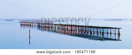 Shellfish farming from Po river lagoon Italy. Scardovari beach. Italian rural landscape