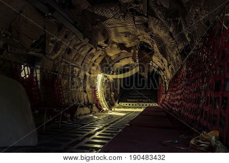 Interiors of abandoned airplane old crashed aircraft plane wreck in graveyard