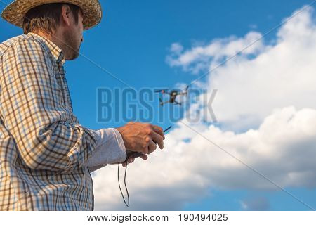 Farmer using drone remote control smart farming agricultural activity and the future of agriculture