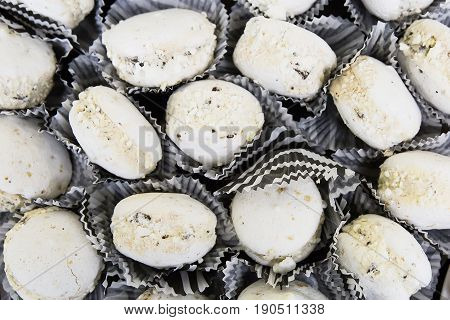 Tasty White Macaroons On Table