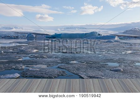 Opening wooden floor Iceland winter season lagoon natural landscape background