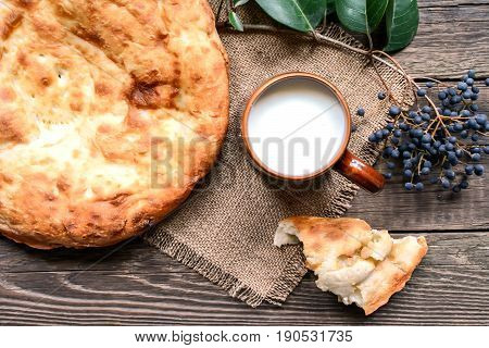 Pita flatbread,. traditional asian bread on wooden background