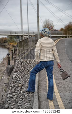 Trendy Older Lady In Denim Jeans In Carmarthen, Wales