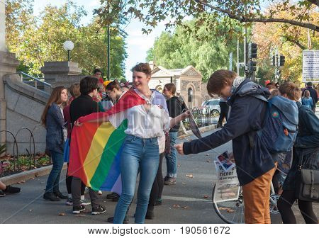 Adelaide, AU - June 10, 2017: South Australians gather at Parliament House and Rundle Mall to protest Trump's assumed support for laws discriminating against LGBTI people in the name of religious freedom.
