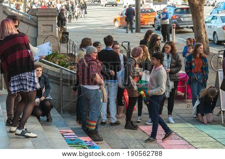 Adelaide, AU - June 10, 2017: South Australians gather at Parliament House and Rundle Mall to protest Trump's assumed support for laws discriminating against LGBTI people in the name of religious freedom.