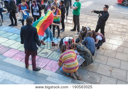 Adelaide, AU - June 10, 2017: South Australians gather at Parliament House and Rundle Mall to protest Trump's assumed support for laws discriminating against LGBTI people in the name of religious freedom.