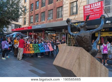 Adelaide, AU - June 10, 2017: South Australians gather at Parliament House and Rundle Mall to protest Trump's assumed support for laws discriminating against LGBTI people in the name of religious freedom.