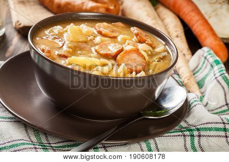 Traditional Polish Split Pea Soup With Sausage, Bacon And Potatoes