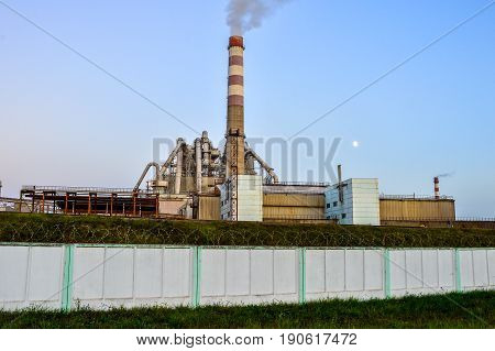 Pollution of atmospheric air from the chimneys of plants.