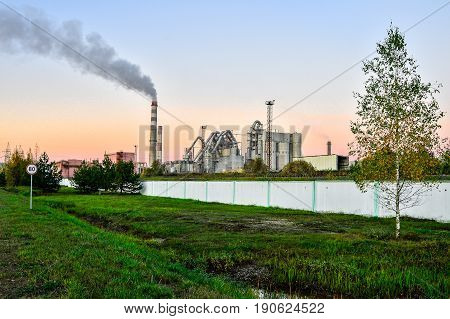 Pollution of atmospheric air from the chimneys of plants.