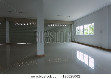 Empty Room In House Residential Building With Aluminium Roller Shutter Door And Window Glass Sliding