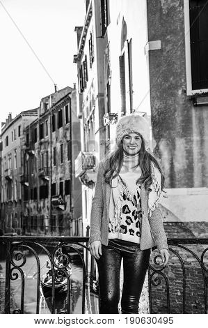 Smiling Modern Traveller Woman In Venice, Italy In Winter