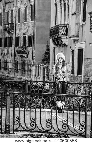 Happy Young Traveller Woman In Venice, Italy In Winter