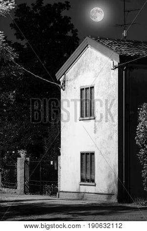 Rovigo, Italy, June, 9, 2017: night landscape with the image of an old house in Rovigo, Italy