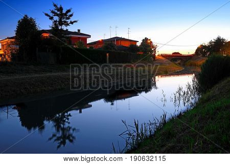 Rovigo, Italy, June, 9, 2017: night landscape with the image of channel in Rovigo, Italy