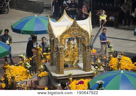View Of The Hindu Shrine From Bts Skytrain And Thai And Foriener People Praying Thao Maha Phrom Or L