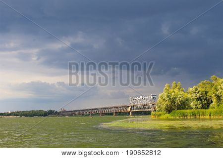 Bridge Across River Dnieper And Storm Clouds In Sky