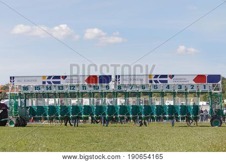 STOCKHOLM SWEDEN - JUNE 06 2017: Empty startboxes at the gallop horse race at Nationaldags Galoppen at Gardet. June 6 2017 in Stockholm Sweden