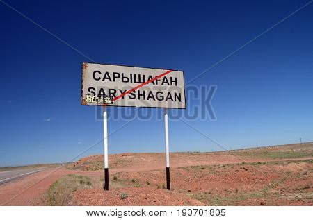 Road sign.Area of former Soviet  anti-ballistic missile testing range SaryShagan.Kazakhstan.May 6, 2017.Sary Shagan.Kazakhstan