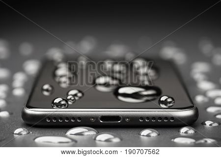 close-up phone be waterproof shot on black background