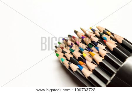 close up of spilled colored pencil container