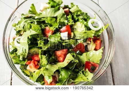 Bowl Of Fresh Salad With Tomato And Cheese Onion