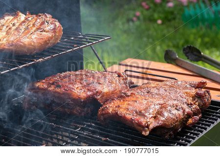 Grilled pork ribs on the grill barbecue