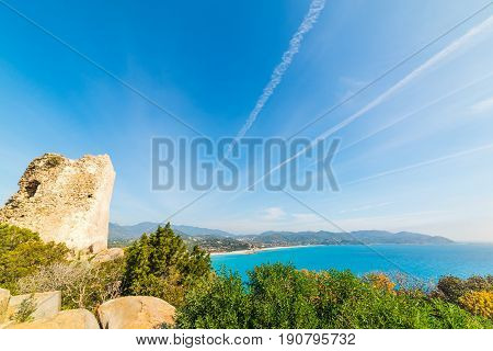 Old tower in Porto Giunco coast. Sardinia Italy