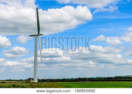 Day view wind power turbines generate electricity.