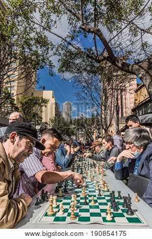 Bogota, Colombia  - February 4, 2017 : Chess players on Carrera Septima in Bogota capital city of Colombia South America