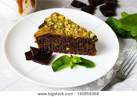 Chocolate Cake With Pistachios And Salted Caramel