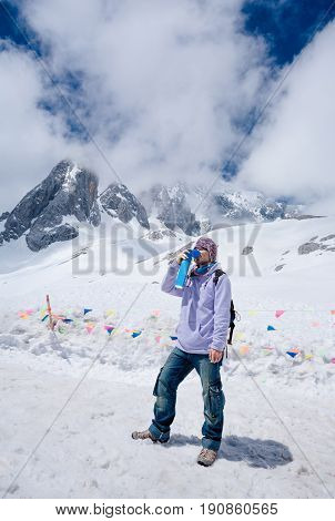 Climber Breathing With Mini Portable Oxygen