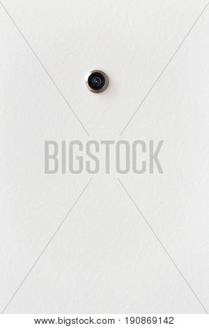 White Door With Eye Hole Or Door Viewer Peep Hole With Space For Text.