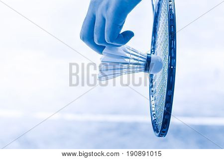 Badminton Sport Start Playing, Closeup Hand Serve Badminton Shuttlecock In Badminton Court.