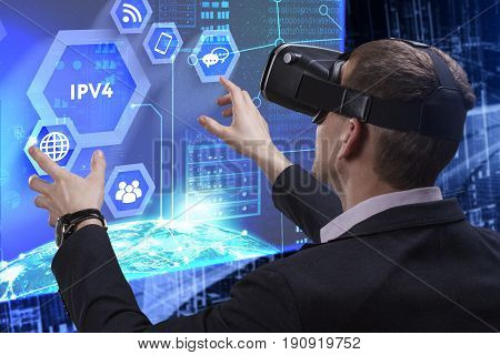Business, Technology, Internet And Network Concept. Young Businessman Working On A Virtual Screen Of