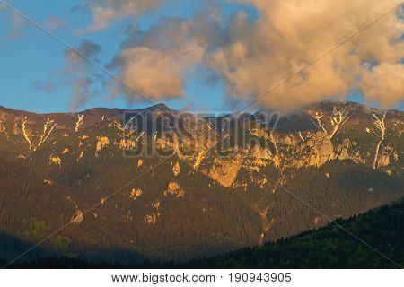 Majestic View With Sunset Light On The Snowy Bucegi Mount Peaks Carpathians Mountains Range Romania.