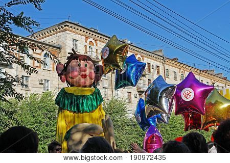 Volgograd Russia - August 26 2014: Kinds doll in the parade of circus performers 