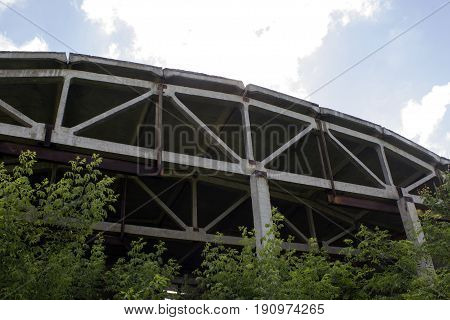 Abandoned unworthy hangar in the open air