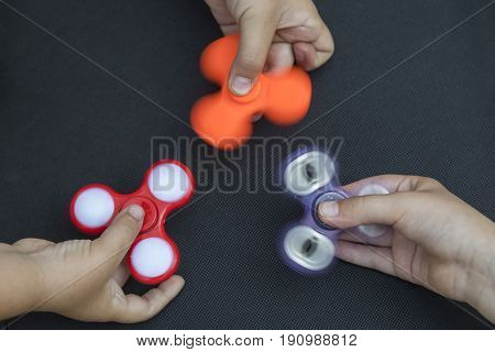 A fidget spinner popular toy for increased focus stress relief.