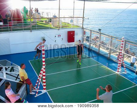 Miami, United States of America - January 12, 2014: The people resting at Carnival Glory Cruise Ship, the ship leaving Miami, USA on January 12, 2014. Carnival Glory is a Conquest-class cruise ship built in 2003 with capacity of 2974 passengers