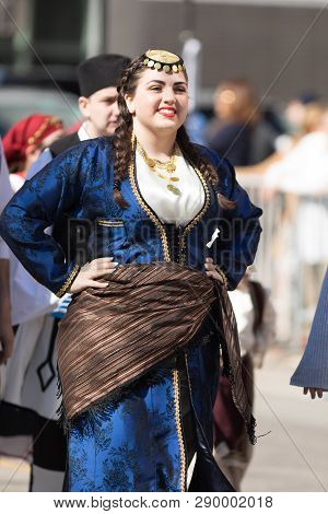 Chicago, Illinois, USA - April 29, 2018 woman wearing Pontos  traditional clothing at the Greek Independence  Day Parade