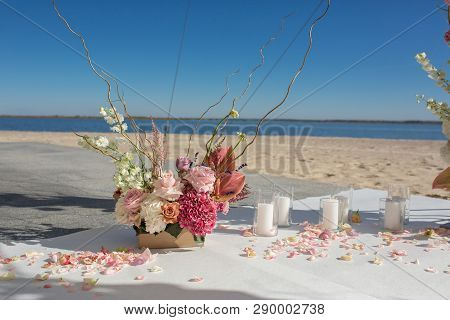 Event Decoration. Wedding Chuppa At Riverside Decorated With Fresh Flowers. Florist Workflow.