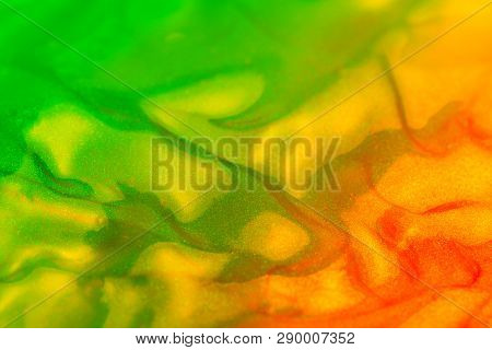 Vaporwave Style Texture Background: Neon Orange And Green Funky Paint Texture.