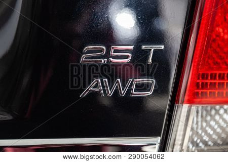 Novosibirsk, Russia - 08.01.18: Rear Emblem 2.5 Litres Awd View Of Black Used Volvo S60 Car Stands I